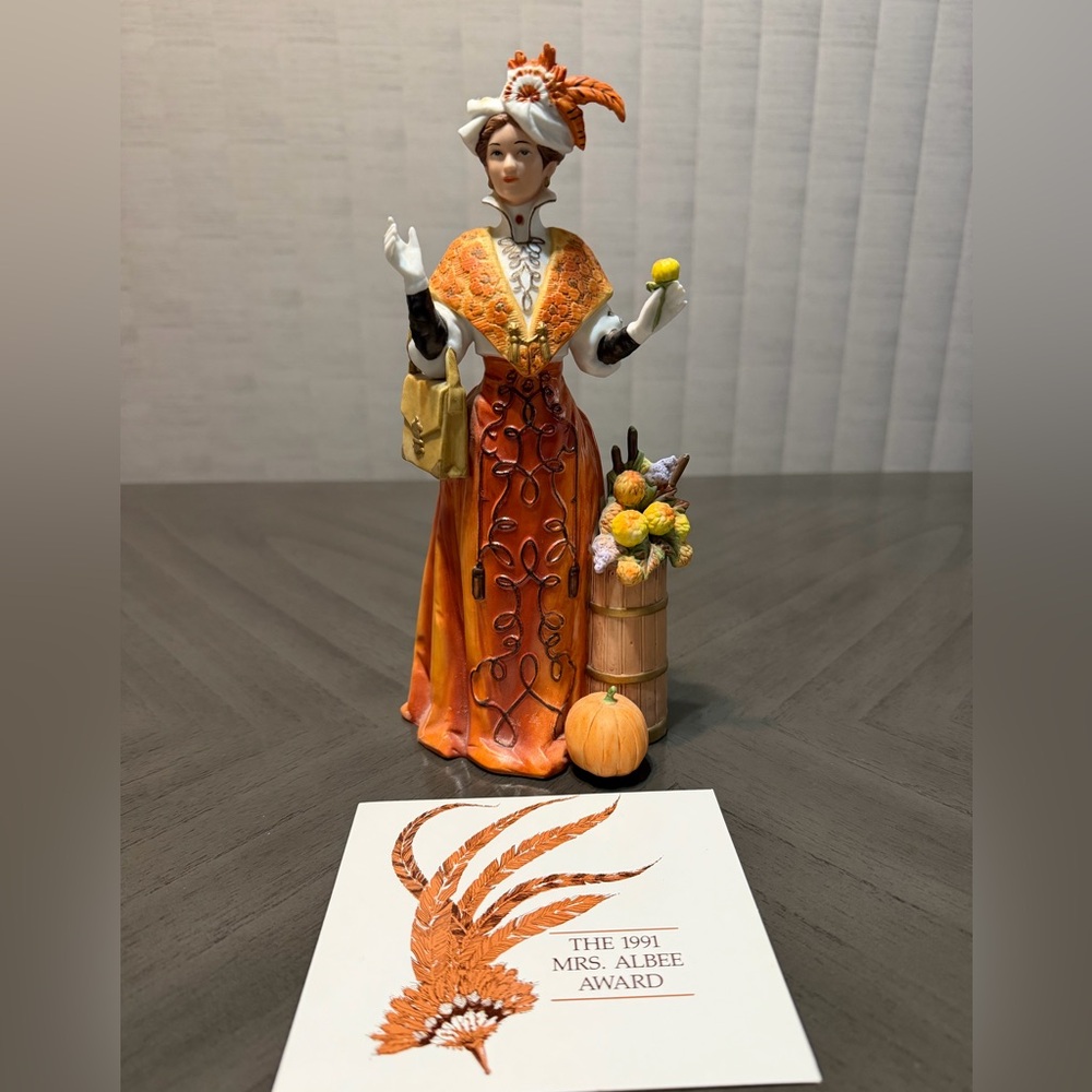 1991 Mrs.Albee Lady Figurine in Orange Dress with Basket & Pumpkin